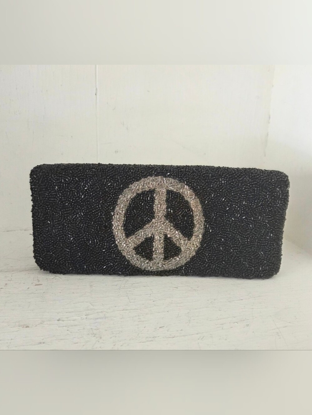 Moyna Black Beaded Clutch with Silver Peace Emblem